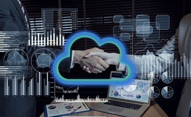 Mayo Clinic-Mercy Data Collaboration Aims to Drive Improved Outcomes. Two business people shake hands with their hands appearing inside a digital cloud icon with medial data analytics overlaid across the rest of the image.