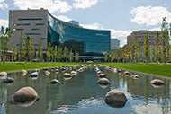 Cleveland Clinic with reflecting pool in front of it stock photo