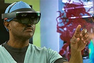 Mayo Clinic, ASU Tap Six Startups for Inaugural Accelerator Class. Image of clinician use virtual reality googles.