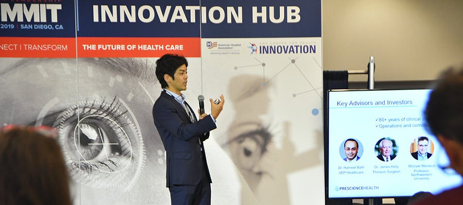 A participant in the AHA Center for Health Innovation Startup Competition at the 2019 AHA Leadership Summit presents his startup idea.