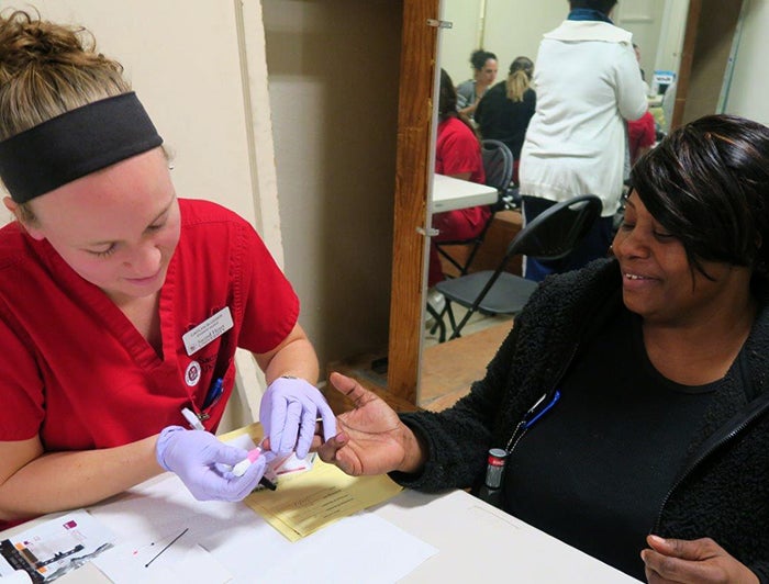 bridgeport hospital nurse taking blood for health screening