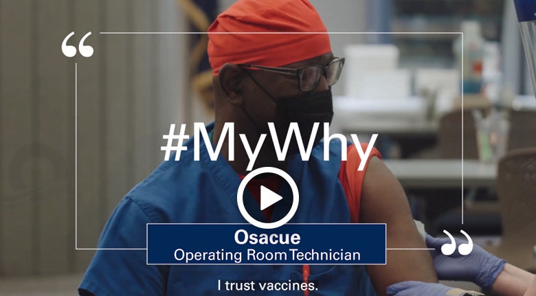 #MyWhy - Health worker Osacue, operating room technician, wearing mask and scrubs, with sleeve rolled up in preparation for COVID-19 vaccination
