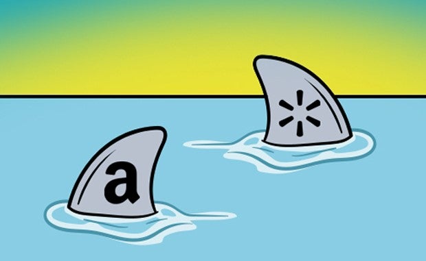 Walmart and Amazon Execs Tip Strategy Plans. Two shark fins, one with an Amazon logo and one with a Walmart logo, are visible above the surface of the ocean swimming in opposite directions.