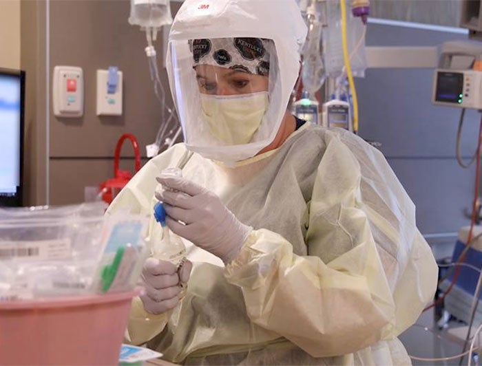 Health worker in full PPE