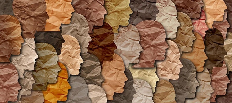 Human heads in profile representing every race of humans on Earth.
