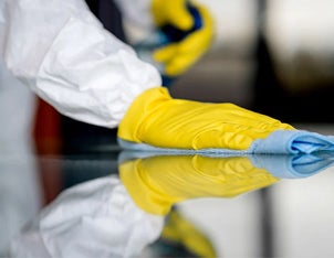 EVS Competency Resource Catalog - PPE glove cleaning surface