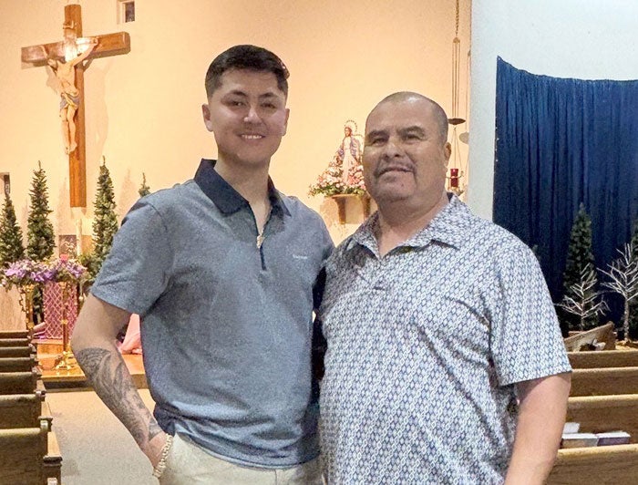 Saaith Lara, left, with his father, Alonso Lara