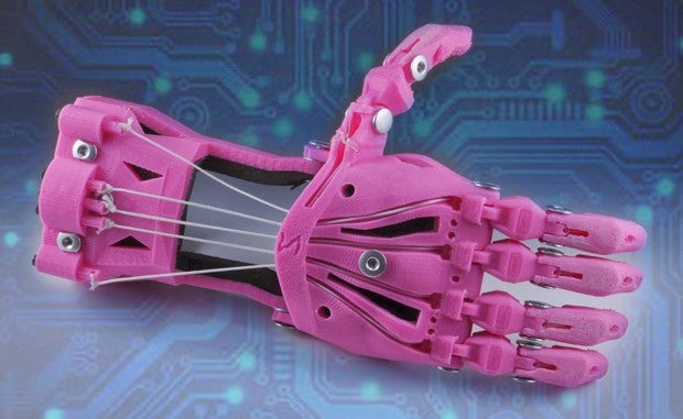 3 Ways 3D Printing Is Revolutionizing Health Care. A pink 3D-printed prosthetic hand.