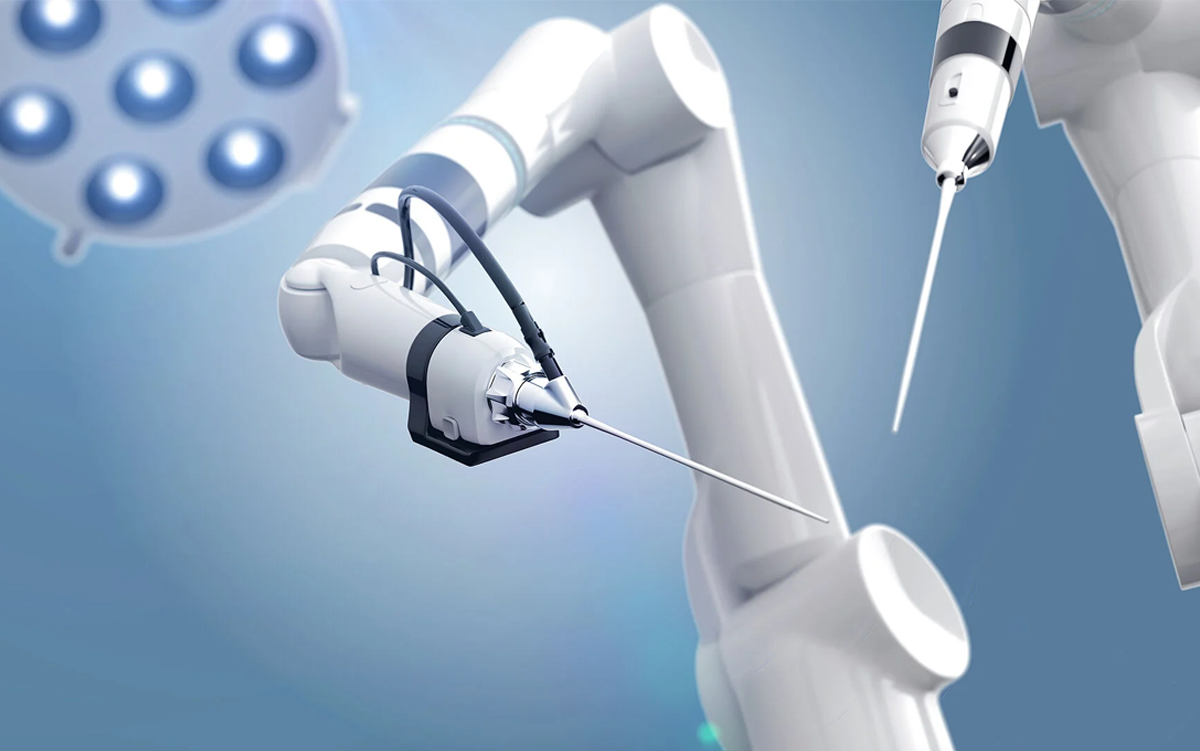3 Ways Robotic Surgery Is Changing Health Care This Year. Robot arms in a surgery room.
