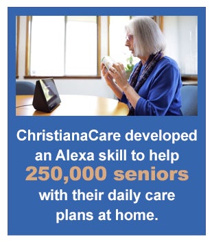 A women speaks into a Amazon Echo Show 5. ChristianaCare developed an Alexa skill to help 250,000 seniors with their daily care plans at home.