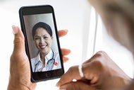 $106 Billion in Health Care Spending Could Be Virtual by 2023. A patient talks to her doctor on her phone during a telehealth appointment.