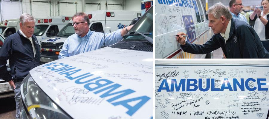 A Second Life for Ambulances Is Saving Lives in Ukraine. Rick Pollack, American Hospital Association president and CEO, reviews donated ambulances that will be sent to Ukraine and signs one ambulance.