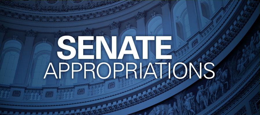 inside of capitol building with blue tint, white text that reads "SENATE APPROPRIATIONS"