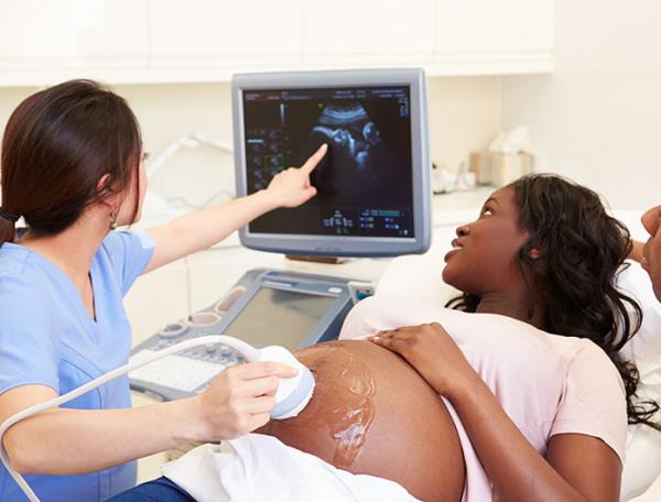 pregnant black mother gets ultrasound