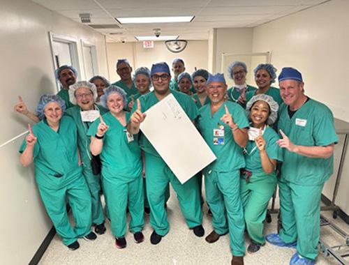 Via Christi St. Francis Heart Team poses in a hospital hallway