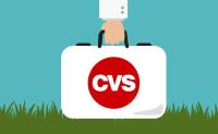 CVS Health Adds Home Health Services. What’s Next? The arm of a doctor is shown carrying a medical bag with the CVS logo on it.